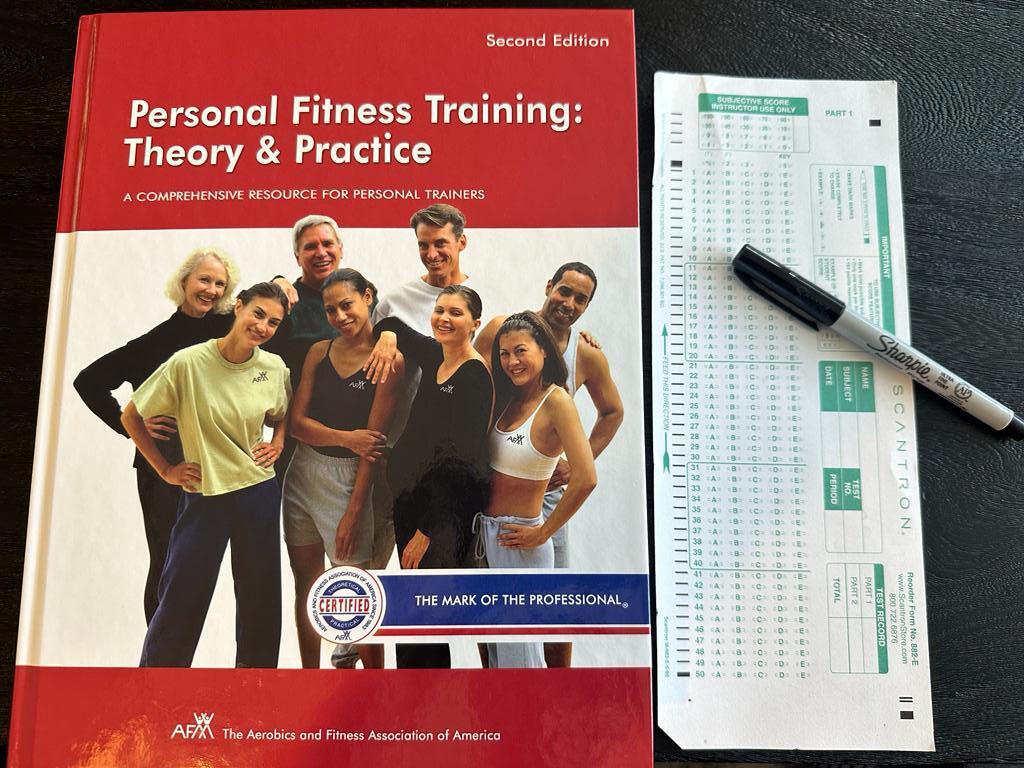 taking the afaa final exam - afaa textbook with scantron sheet on table to take afaa exam