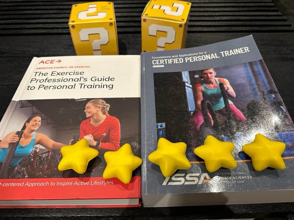 ISSA and ACE textbooks with yellow question boxes and stars - which cpt is better - ACE vs ISSA overall rating