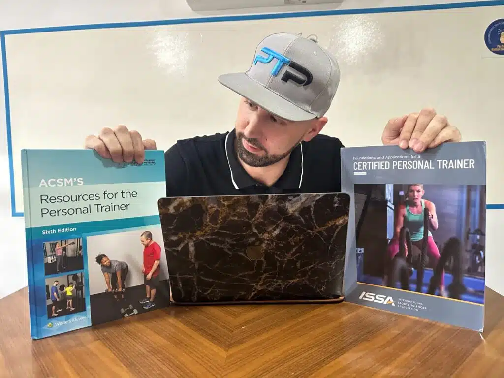 ISSA vs ACSM - Which Fitness Certification is Best? 30 Tyler Read holds up ACSM and ISSA textbooks - which is best - ISSA vs ACSM
