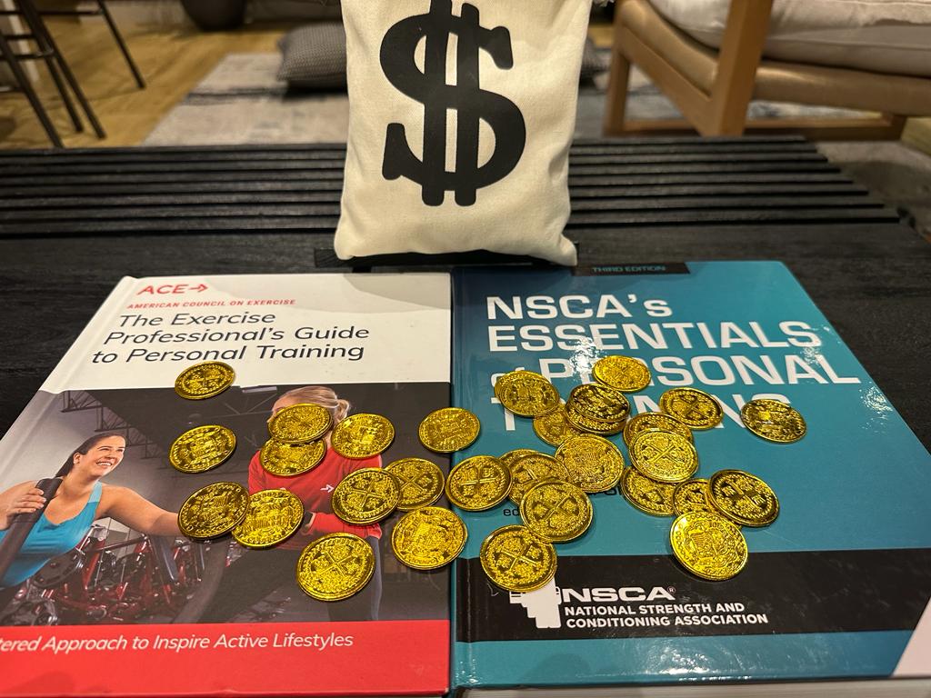 NSCA vs ACE - textbooks laid out on table with gold coins and money bag - which costs more?