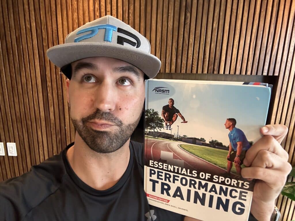 is the nasm pes certification worth it. Tyler holds up NASM Performance Enhancement Specialist Textbook and decides if the NASM CES makes sense for his personal training career