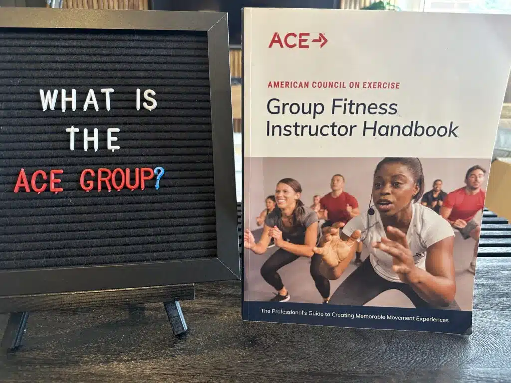 The Ultimate ACE Group Fitness Instructor Review 4 ACE group exercise instructor review - black board with what is the ace group on it next to the ace group instructor textbook