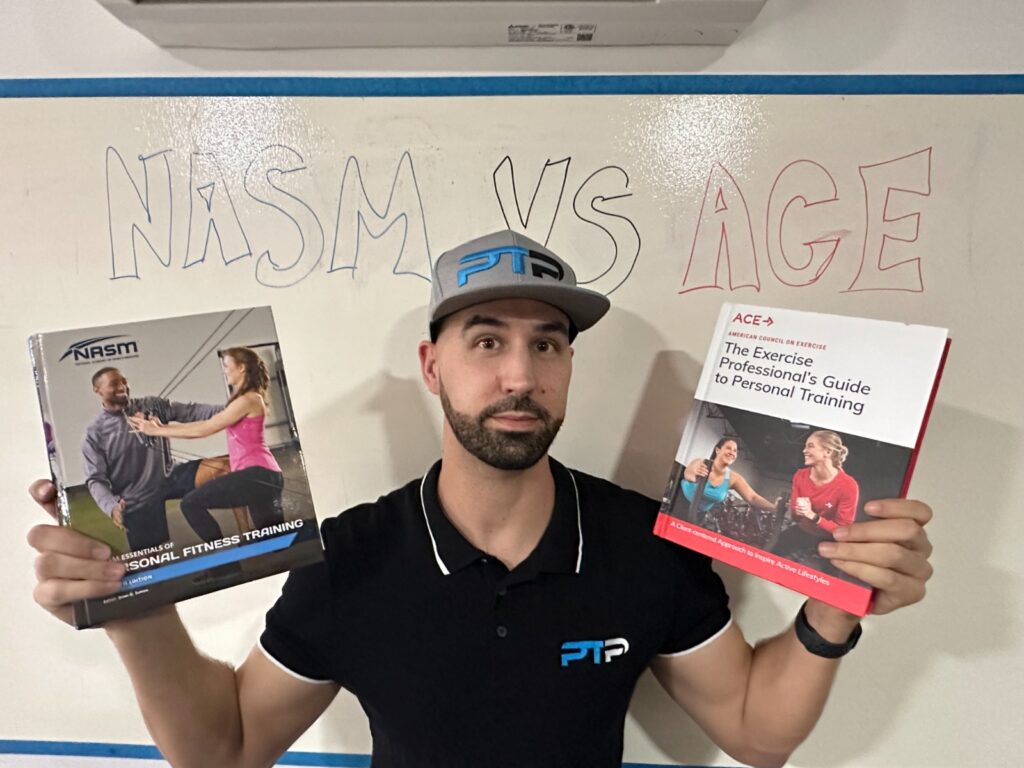 NASM vs ACE pros and cons - Tyler Read stands in front of white board with NASM vs ACE on it holding up both textbooks