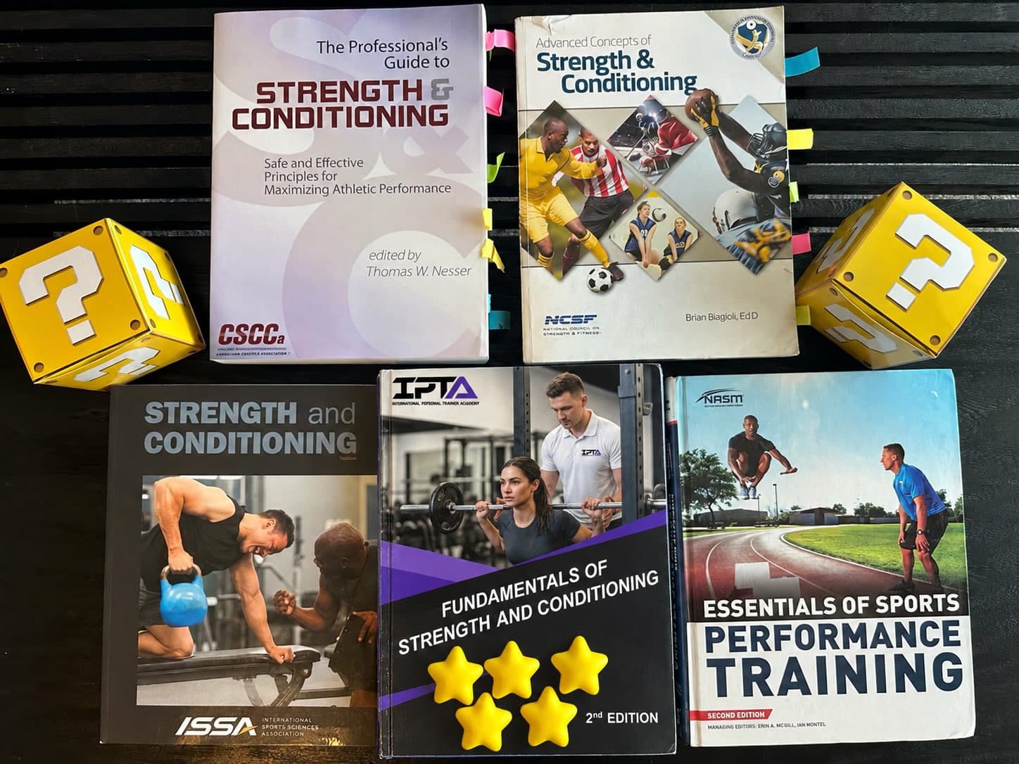 best strength and conditioning coach certifications laid out on table with yellow boxes and stars - IPTA, NASM, ISSA, NSCA, CSCCA, NCSF