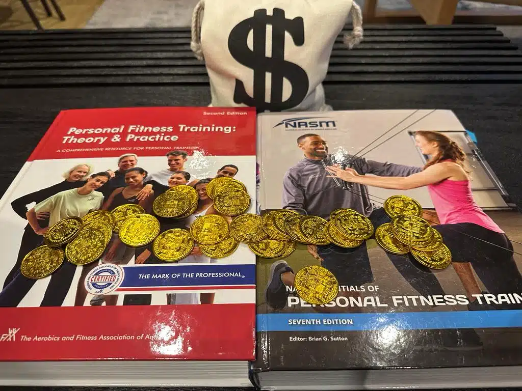 NASM vs AFAA Certification Comparison Review 25 AFAA vs NASM - textbooks with gold coins and money bag - which costs more, afaa or nasm?