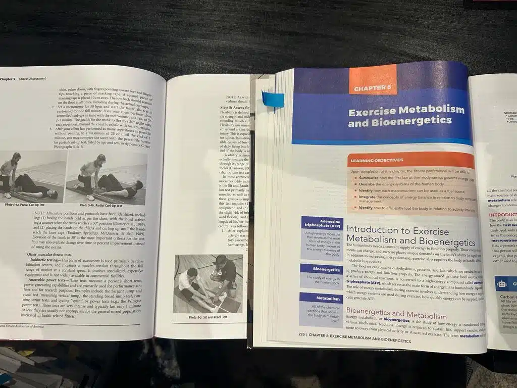NASM vs AFAA Certification Comparison Review 27 AFAA vs NASM - textbooks open to pages open to chapter 8 on bioenergetics
