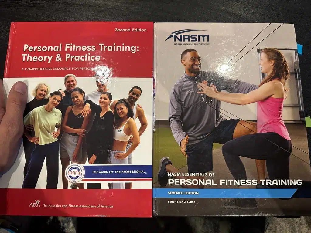 NASM vs AFAA Certification Comparison Review 24 NASM vs AFAA - textbooks laid out