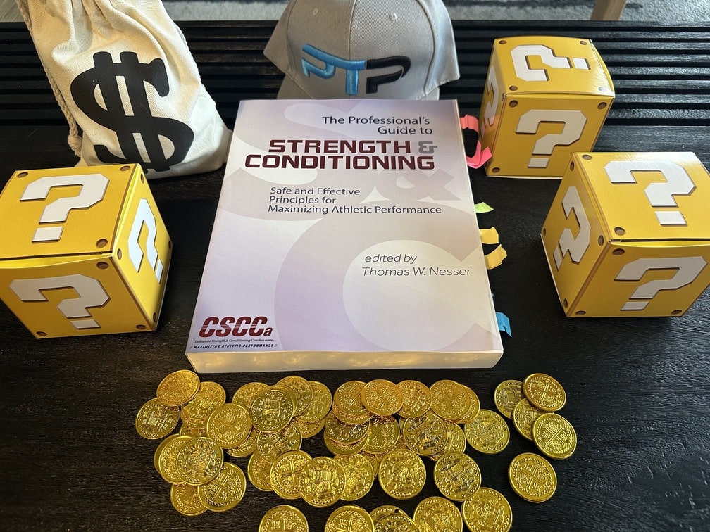 CSCCA Review - Become a Strength & Conditioning Coach 18 cscca certification - strength and conditioning textbook on table with gold coins, question mark boxes, and money bag - how much does the cscca cost