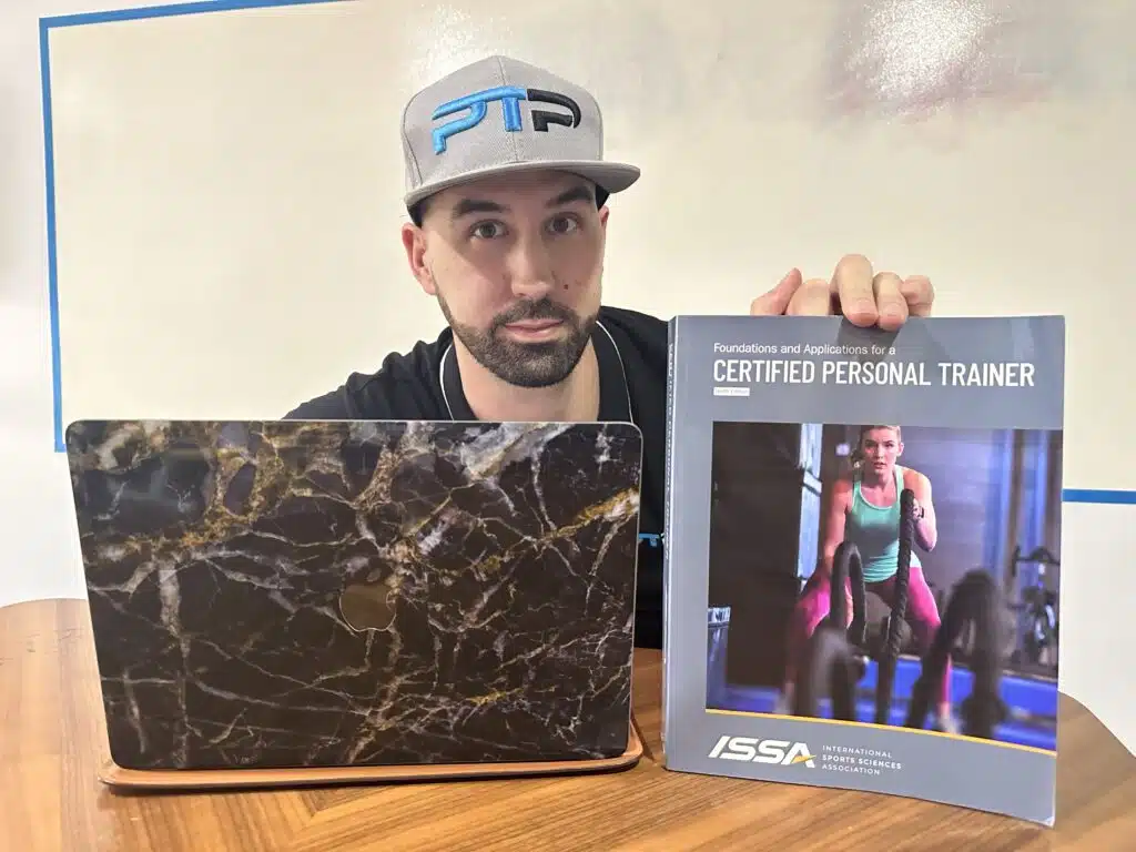 ISSA Training Certification Review 2023 - Is ISSA Worth It? 1 ISSA Training Certification Review - Tyler Read shows ISSA CPT certification review materials.