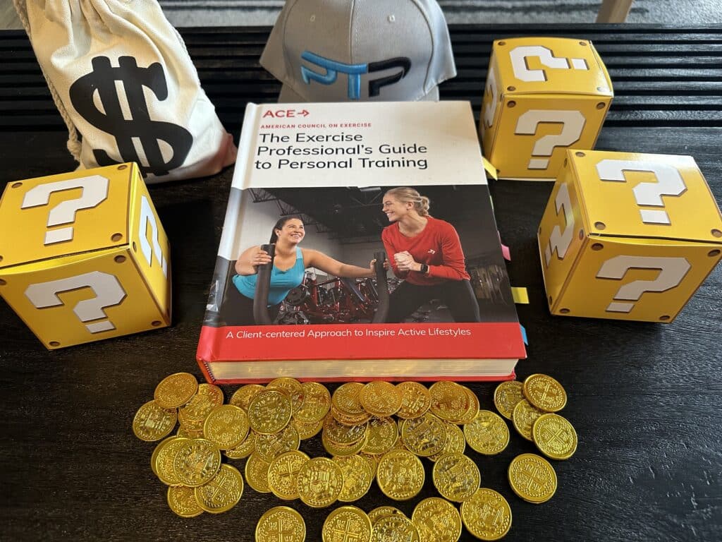 ACE certification cost and packages - ace textbook displayed on table with coins