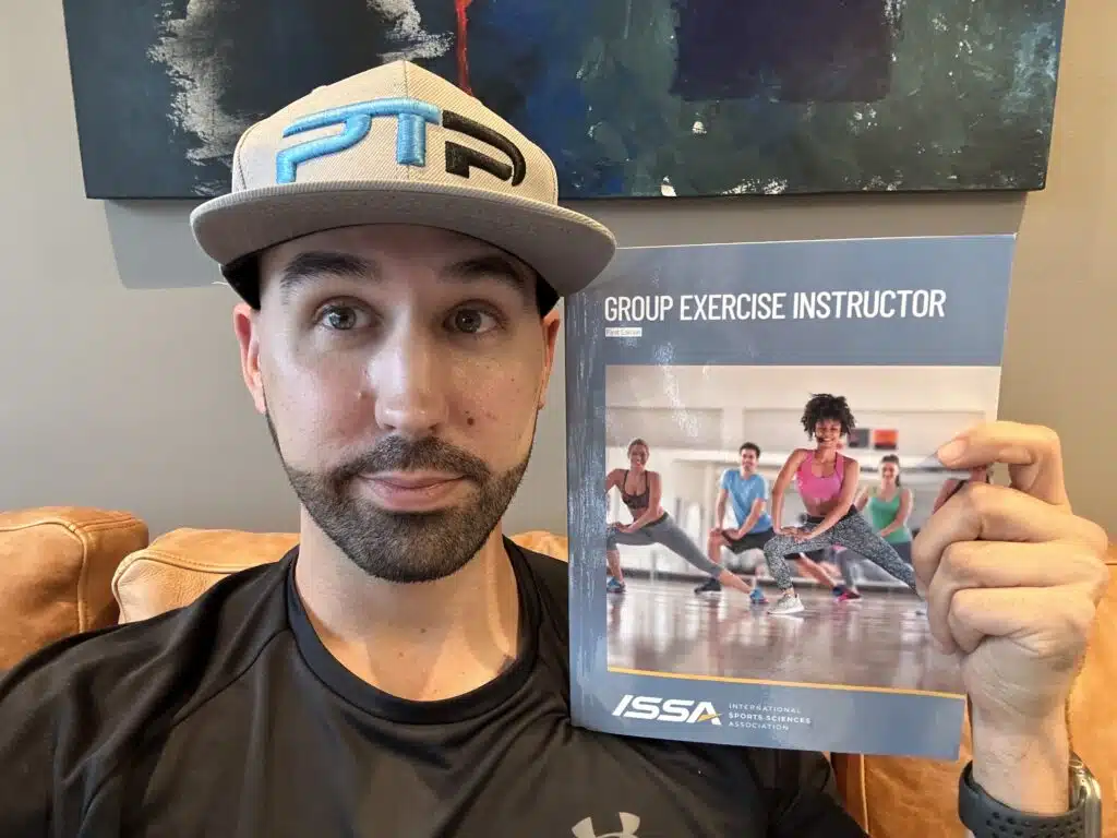 ISSA Group Exercise Instructor Certification Review 12 issa group exercise certification review - Tyler Read holds the ISSA Group Exercise textbook
