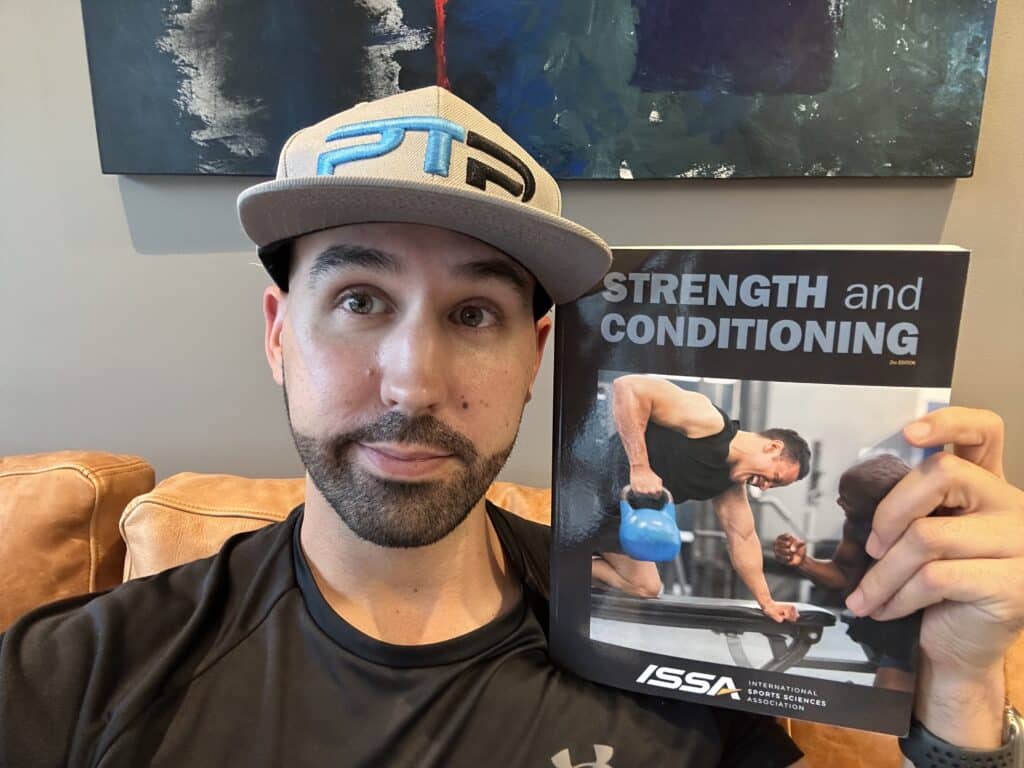 issa strength and conditioning certification review. Tyler Read shows the ISSA strength and conditioning certification textbook.