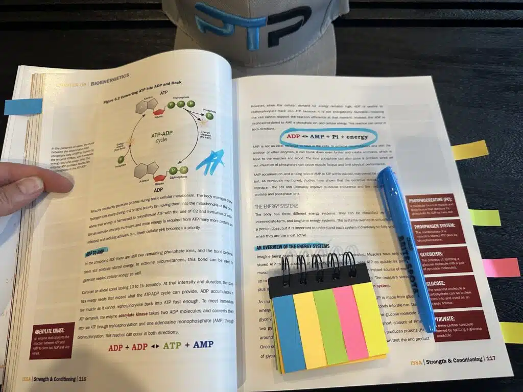 ISSA Strength & Conditioning Certification Review 18 ISSA Strength & Conditioning exam prep and study materials - ISSA textbook open to chapter on ATP cycle.