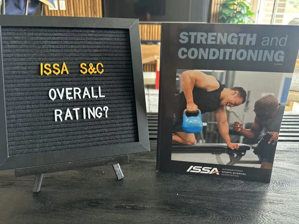 ISSA Strength & Conditioning Certification Review 20 ISSA Strength and Conditioning overall rating - ISSA SSC textbook on table