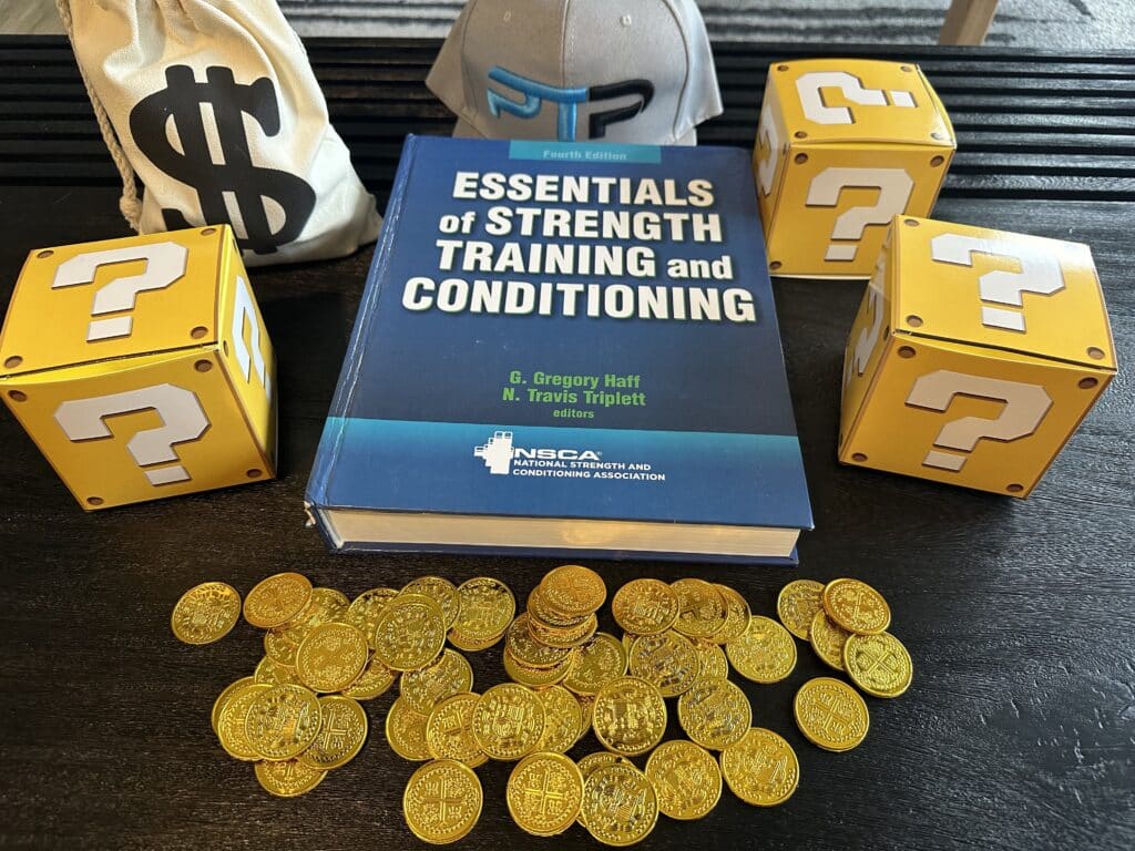 CSCS certification cost and course options. NSCA CSCS textbook with gold coins on table.