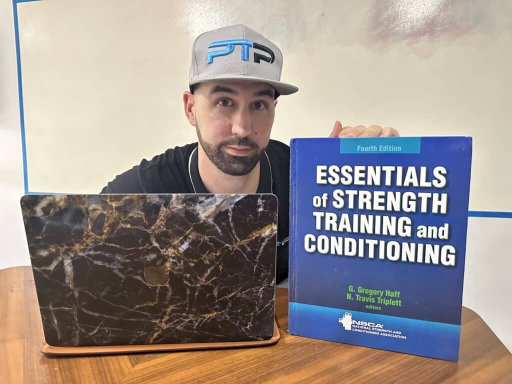 CSCS certification review - Tyler Read showing the NSCA NCSCS textbook