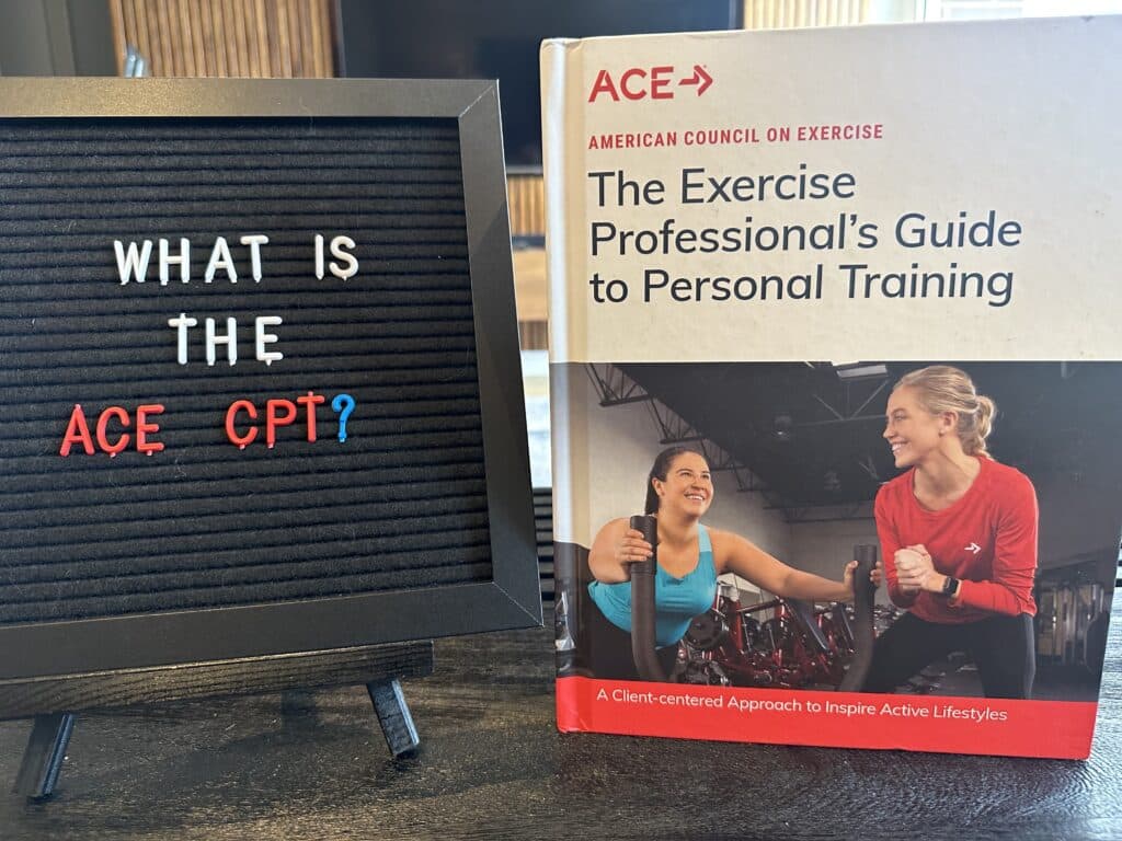 what is the ace cpt - ace personal trainer textbook displayed on table