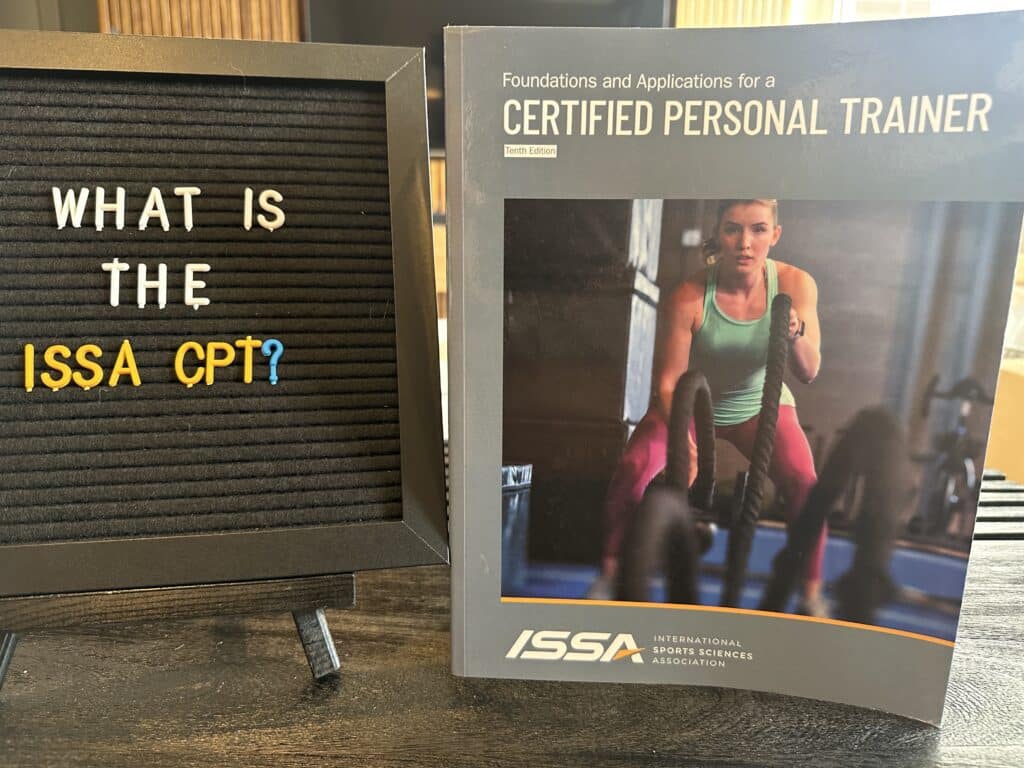 what is the issa cpt? introduction to the ISSA training certification showing ISSA textbook