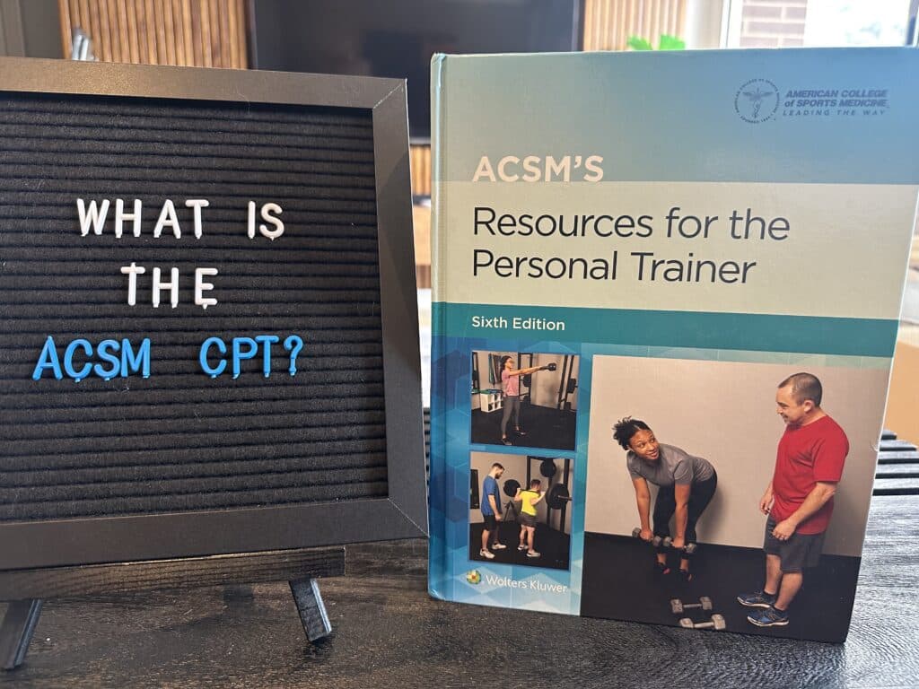 what is the acsm cpt - acsm textbook displayed on table