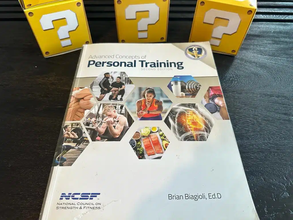 NCSF CPT - Best Personal Trainer Certification programs - NCSF textbook with yellow question boxes