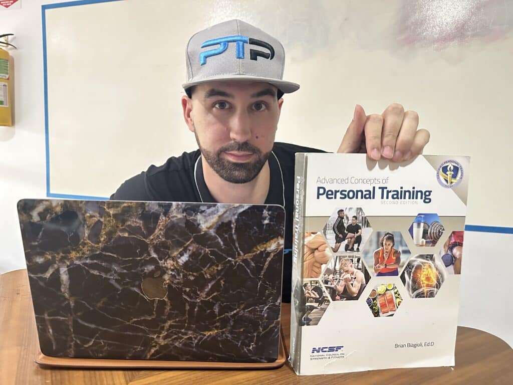 NCSF CPT certification review. Tyler Read holds the NCSF personal training certification textbook and reviews the NCSF personal trainer certification