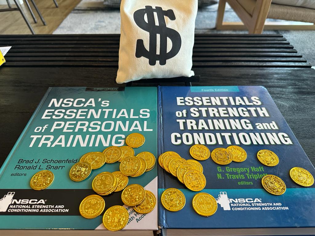 NSCA CSCS vs CPT - textbooks on table with gold coins and money bag - which costs more?