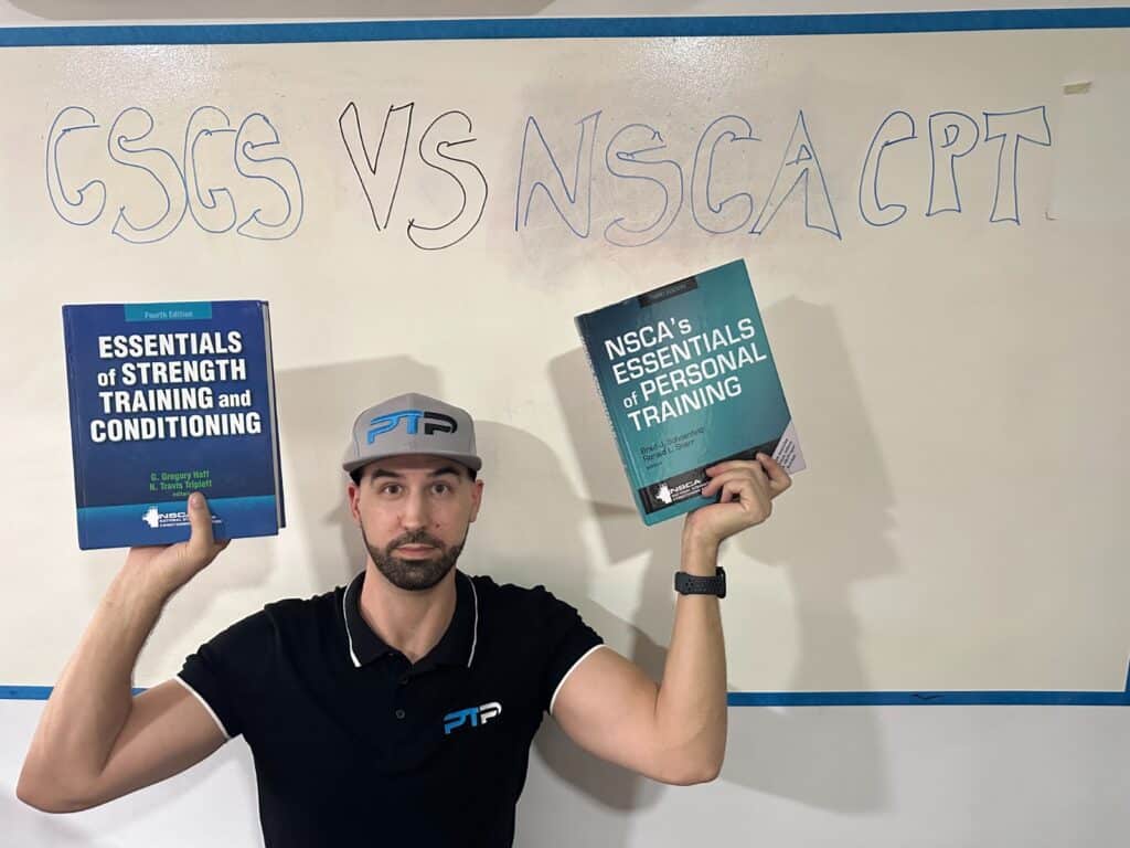 NSCA CPT vs CSCS - Tyler Read holds up textbooks in front of white board with lettering  - pros and cons