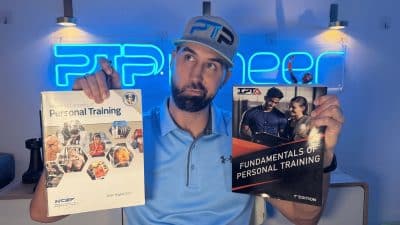 Tyler holding NCSF and IPTA textbooks